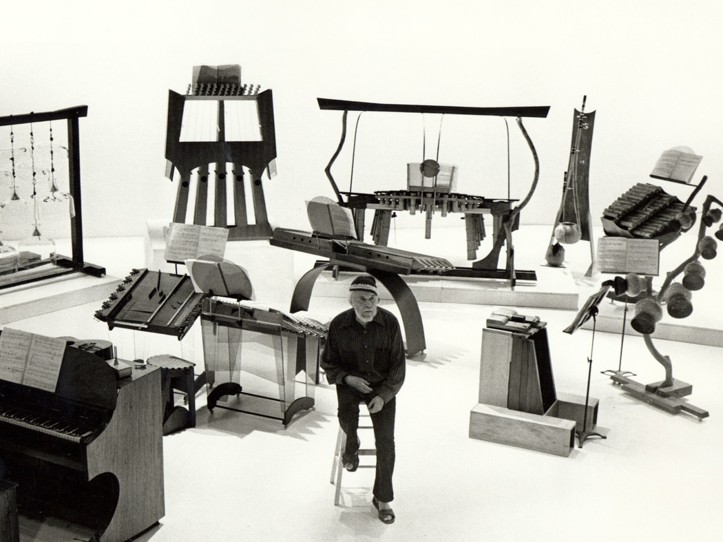 Image of Harry Partch with his instruments
